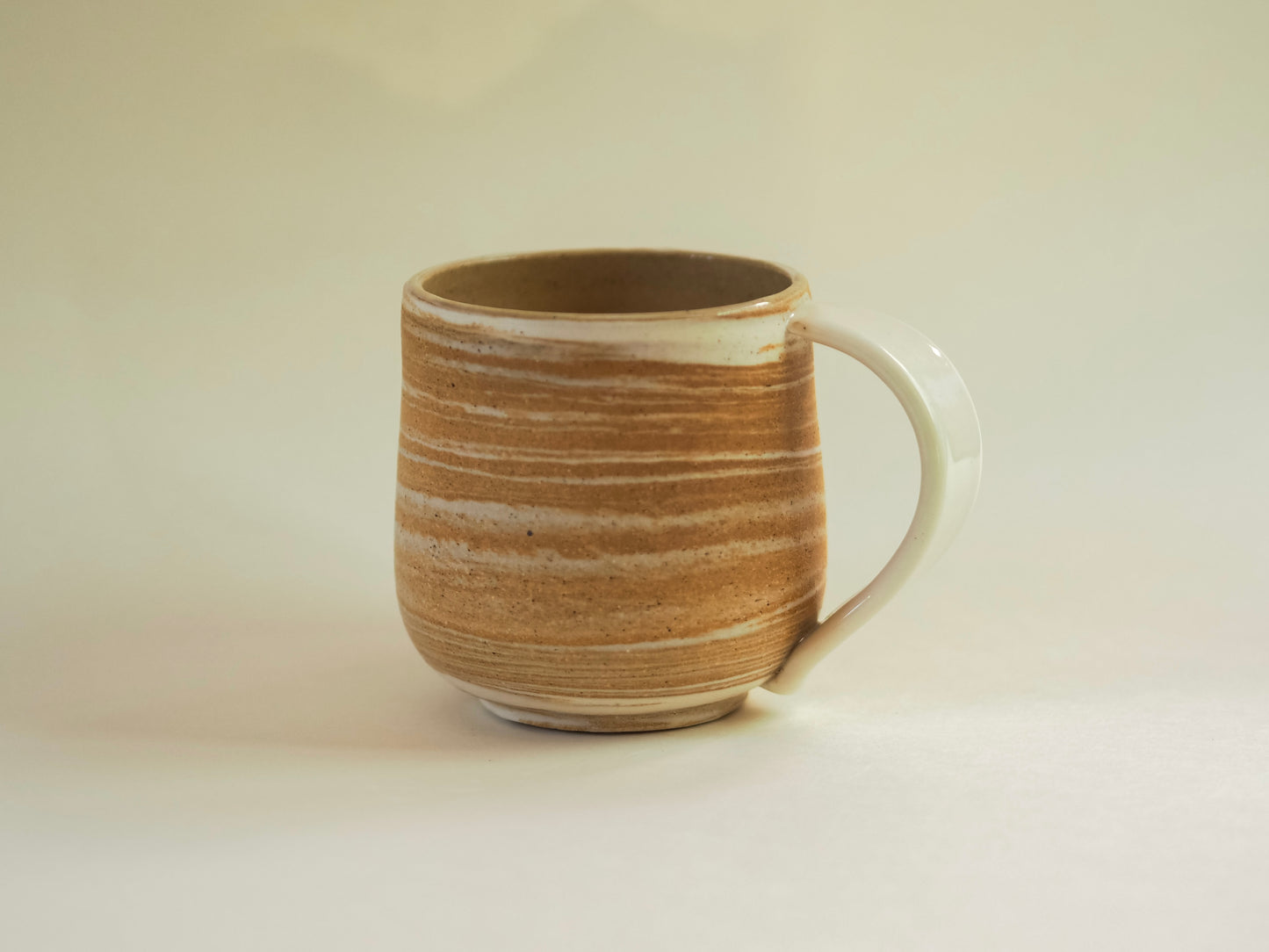 Hand-thrown landscapes mug in stoneware and porcelain, 8oz ceramic coffee mug with natural striations.
