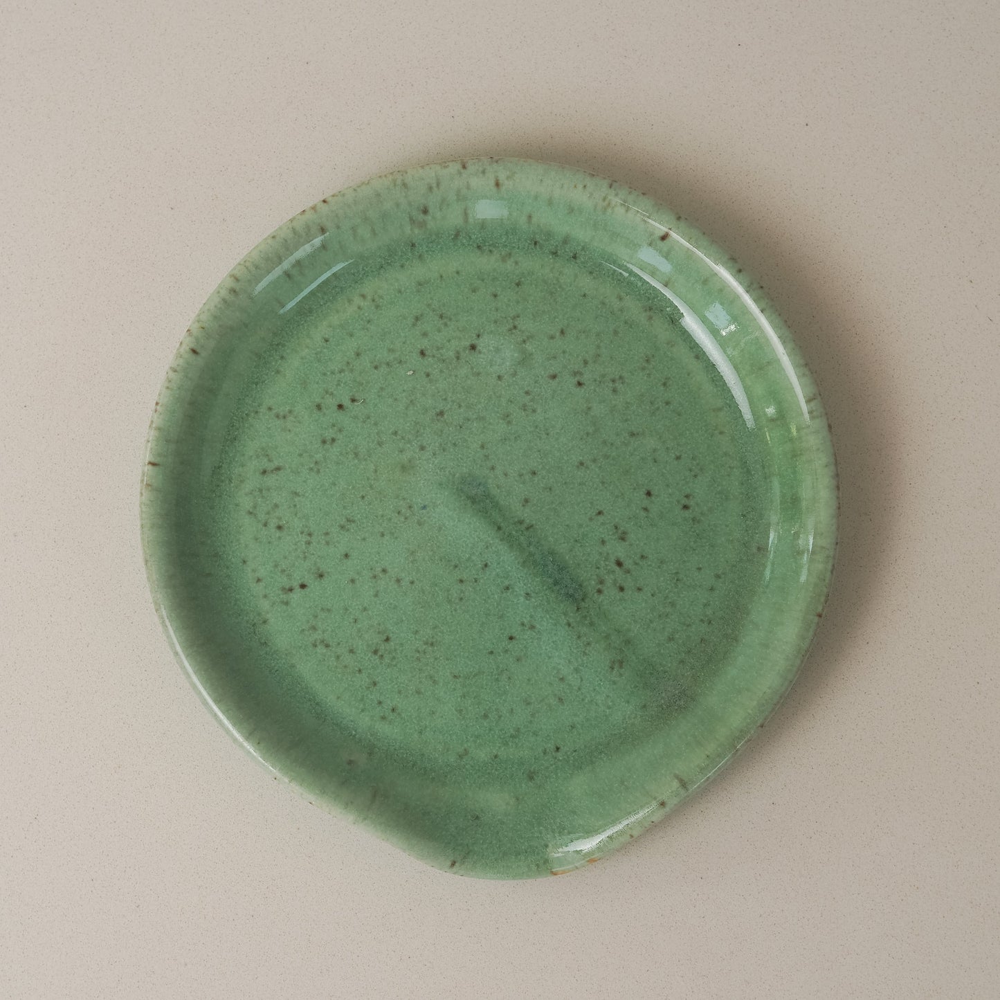 Green ceramic spoon rest