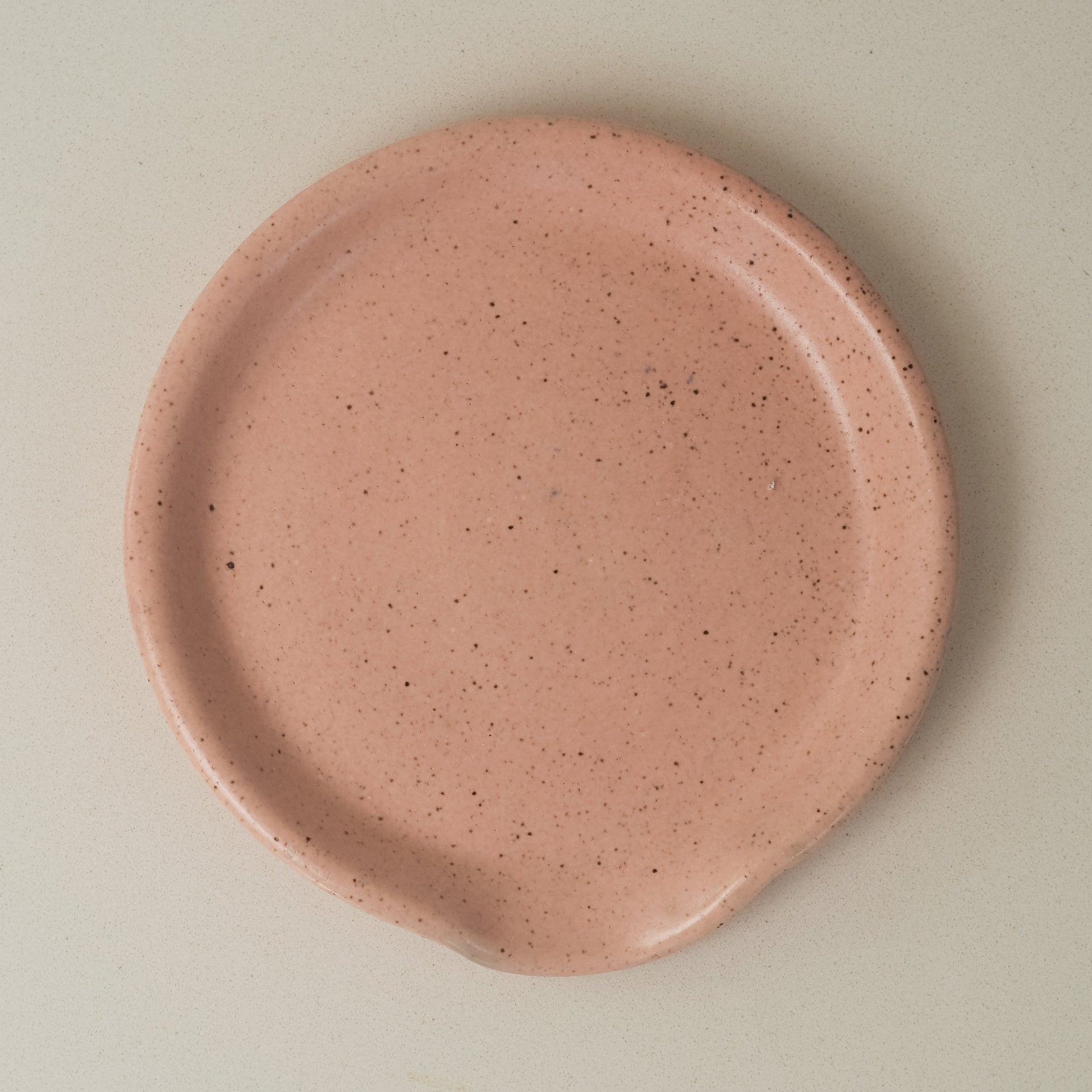 Pink ceramic spoon rest 